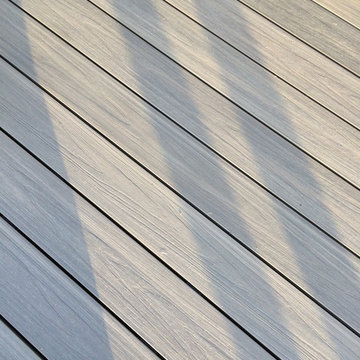 Balcony Transformation with Glass Balustrade and Composite Decking