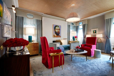 Large transitional formal and enclosed light wood floor living room photo in New York with green walls, a standard fireplace and no tv