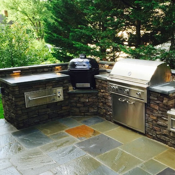 Outdoor Kitchen with built-in Big Green Egg & Grill on a flagstone Patio VA