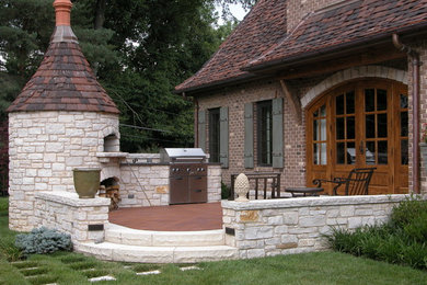 This is an example of a traditional patio in St Louis with no cover.