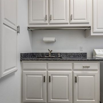 Kitchen Remodel with Storm-Ready Cellar and Hidden Bathroom Storage in Plano