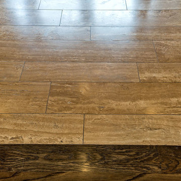 Tile floors that look like wood next to real wood