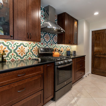 Cheerful Multi Level Rear Addition to Expand Kitchen, Mudroom & Sunroom in Oakt