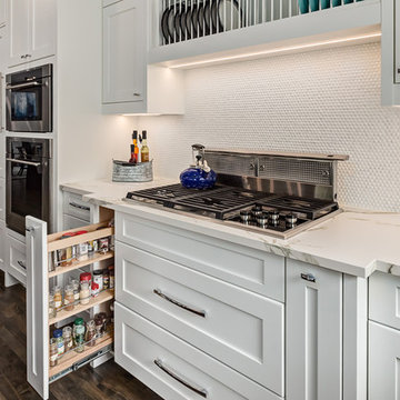Efficient cooking pullouts: spice rack beside the cooktop