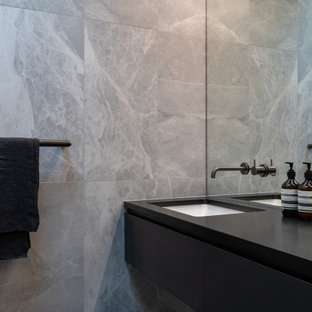 Bäder mit Steinfliesen und Einzelwaschbecken Ideen, Design & Bilder