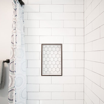 Subway Tile Shower with Geometric Niche Accent
