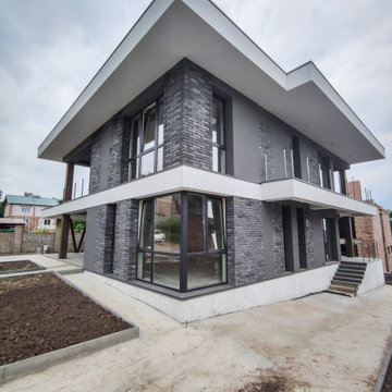 Modern two-story house with a terrace