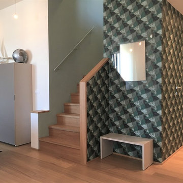 La scala di Escher collega i due piani di un Attico a Milano.