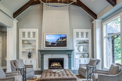 Large transitional open concept dark wood floor and brown floor living room photo in Cincinnati with gray walls, a standard fireplace, a tile fireplace and a wall-mounted tv