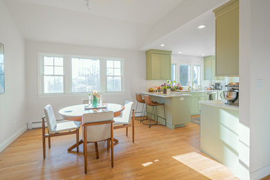 1960s light wood floor and brown floor dining room photo in Philadelphia with white walls