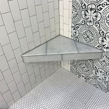 Black & white patterned tile bathroom