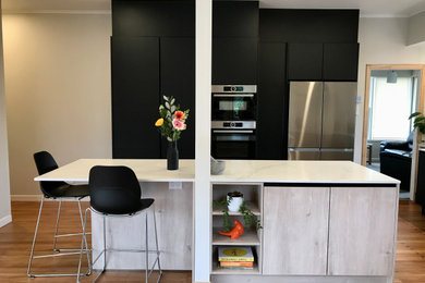 Modern Black and Timber Renovation of a 70's Hamilton Home