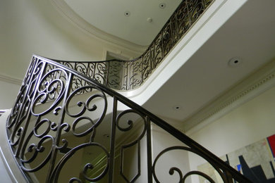 Photo of a curved staircase in Houston.