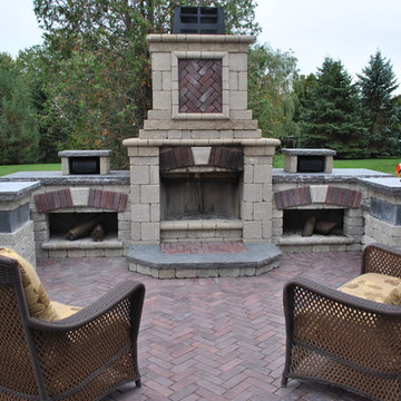 A Backyard Patio With a Spacious Feel and an Amazing Fireplace!
