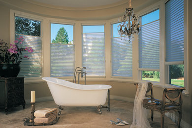 Bathroom - small traditional master mosaic tile slate floor bathroom idea in Grand Rapids with brown walls
