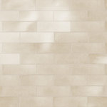 Merola Tile - Coco Glossy Canvas Beige Porcelain Wall Tile - Offering a subway look, our Coco Glossy Canvas Beige Porcelain Wall Tile features a smooth, glossy finish, providing decorative appeal that adapts to a variety of stylistic contexts. Containing 100 different print variations that are randomly distributed throughout each case, this beige rectangle tile offers a one-of-a-kind look. With its impervious, frost-resistant features, this tile is an ideal selection for both indoor and outdoor commercial and residential installations, including kitchens, bathrooms, backsplashes, showers, hallways and fireplace facades. This tile is a perfect choice on its own or paired with other products in the Coco Collection. Tile is the better choice for your space!