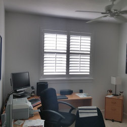 Crestview Shutters using large Deco frame and bi-fold track shutters - Interior Shutters