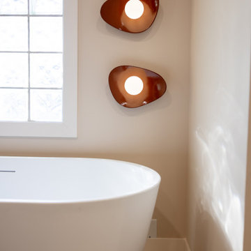 Primary & Guest Bathroom Remodel with Improved Layout and Heated Terrazzo Floors