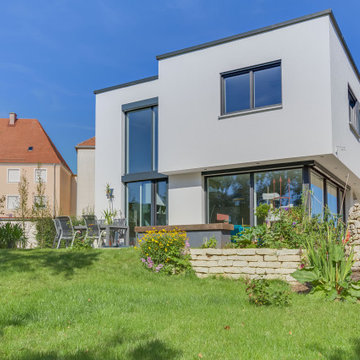 Neubau Flachdachhaus Weißenburg mit Carport