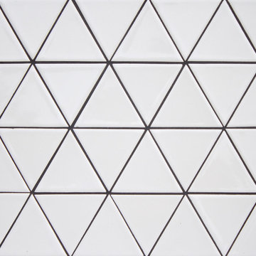Triangle 4" in Milk gloss with Charcoal grout.