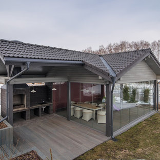 Неиссякаемый источник вдохновения для домашнего уюта: терраса в классическом стиле