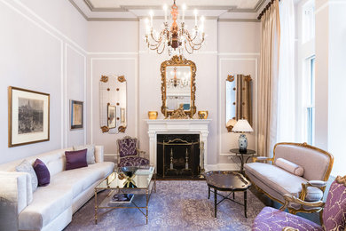 Large elegant formal and enclosed dark wood floor living room photo in New York with gray walls, a standard fireplace and no tv