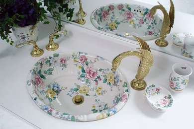 Example of a huge classic master bathroom design in Las Vegas with a drop-in sink and glass-front cabinets