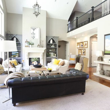 European Splendor, living room, black leather sofa, fireplace, mantle, built in