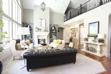 European Splendor,  living room, black leather sofa, fireplace, mantle, built in