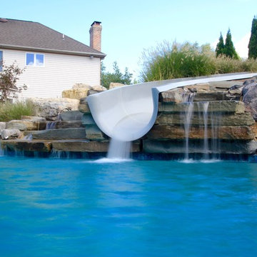Custom Freeform Pool with Swim Up Bar and Waterslide