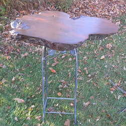 Live edge reclaimed tree stump side table with stylized wrought iron base - Side Tables And End Tables