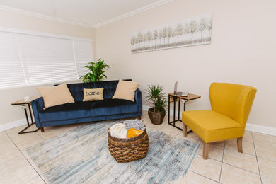 Example of a small trendy open concept living room design in Los Angeles with beige walls