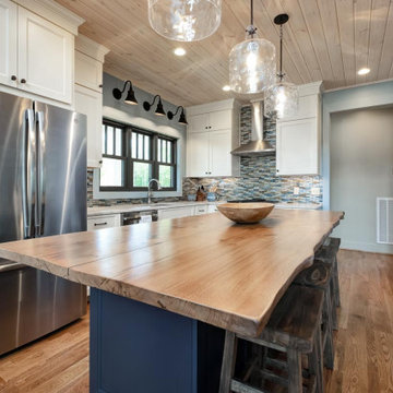 Architectural Designs Exclusive Show-Stopping Vacation Home Plan 18302BE
