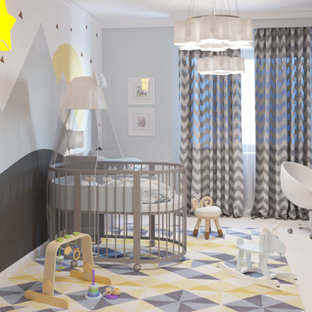 Aménagement d'une chambre d'enfant de 1 à 3 ans contemporaine de taille moyenne avec un mur blanc, un sol en liège et un sol beige.