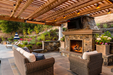 Pergola Pavilion with an Outdoor Kitchen and Living Room