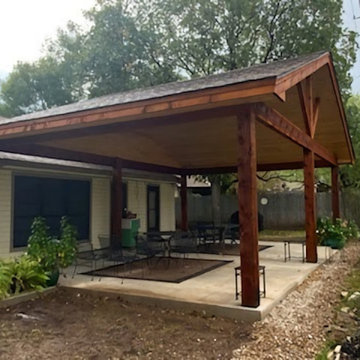 Rough cedar pergola with tongue and groove ceiling
