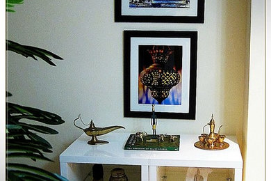 Inspiration for a small eclectic ceramic tile hallway remodel in Other with white walls
