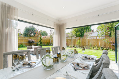 Inspiration for a medium sized contemporary dining room in Surrey.