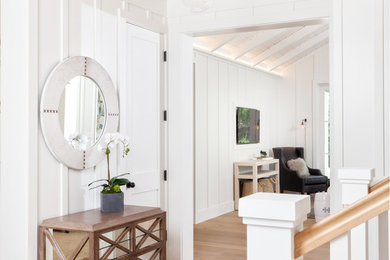 Inspiration for a country entryway in San Francisco with white walls and medium hardwood floors.