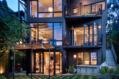 Design ideas for a large contemporary three-storey grey exterior in Seattle.