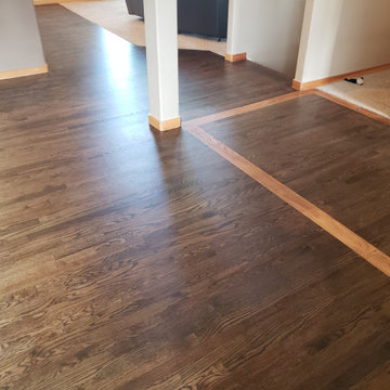 Hardwood Elegance with Custom Inlays & Entry Border