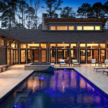 Rice Hope Elevated Spa Spilling into Elegant Pool