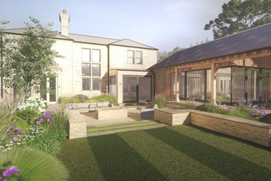 Design ideas for a medium sized classic back formal full sun garden in Other with natural stone paving.