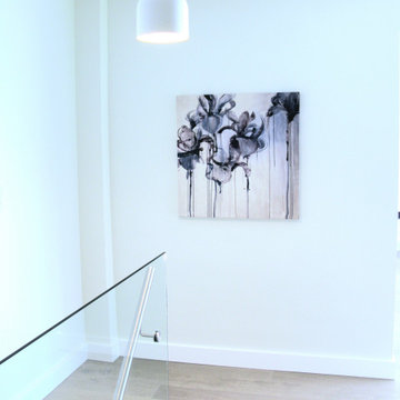 Open Stair Landing with Glass Railing – Upper Lonsdale Renovation