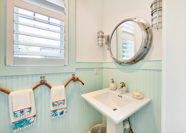 Beach Style Powder Room by Echelon Custom Homes