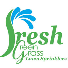 Fresh Green Grass Lawn Sprinklers