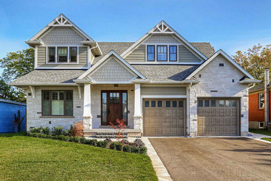 Example of a transitional home design design in Toronto