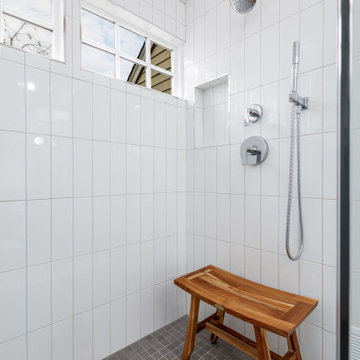 Master Bathroom with Bamboo Cabinet and Penny Tiles