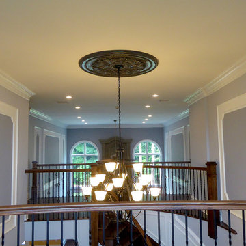 S. Residence | Modern Tale on Center Hall Colonial | Interesting Roof Lines