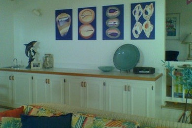 Beach style family room photo in Other